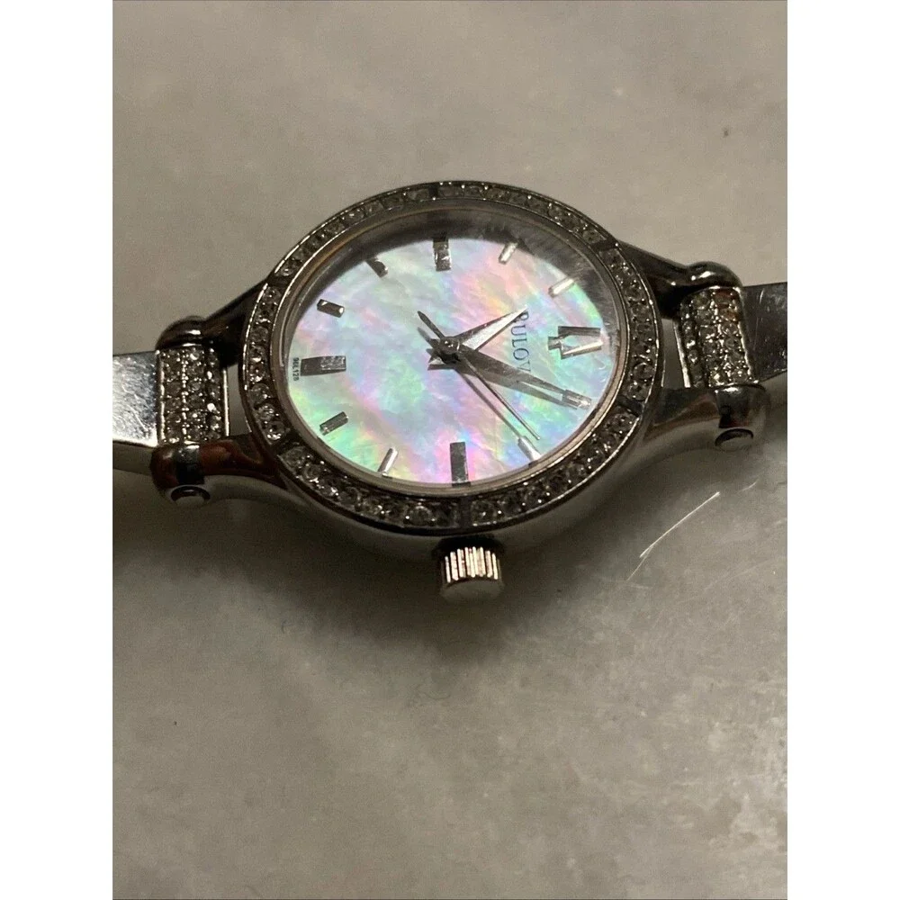 Bulova Women Silver Tone Crystal Bezel Mother Of Pearl Dial Bangle Watch C869915